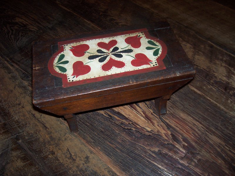100_1778.jpg :: Small mortesed Walnut stool with tulip design$95.00