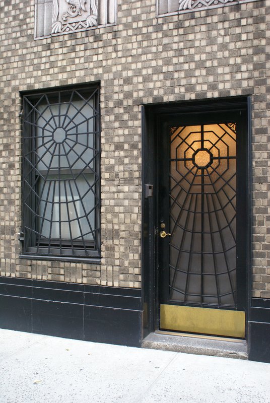 Is Spidey Home.jpg :: Mid-twon Manhattan doorway with unique ironwork.