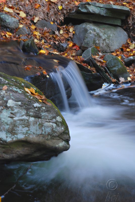 Rocks and smooth water in fall.jpg