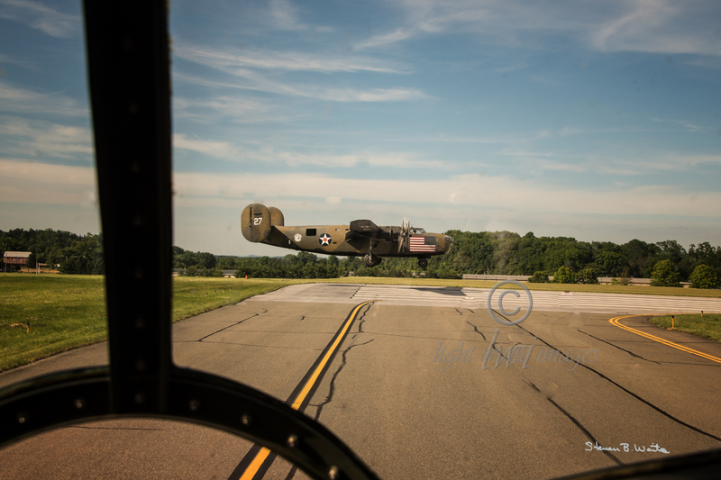 B-24 over Numbers on Runway.jpg