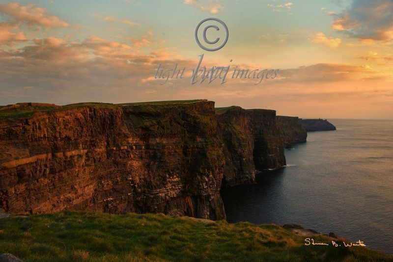 Cliffs of Moher Setting Sun cpyrt.jpg