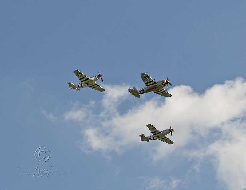 P-47 and P-51 Invasion Formation.jpg :: P-47 Thunderbolt leading two P-51 Mustangs