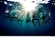 surfers underwater.jpg