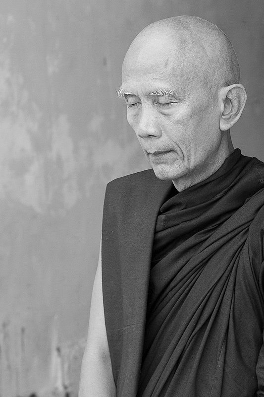 20121125ShweDagon Pagoda-9242.jpg :: Buddhist Monk praying at a temple at the ShweDagon Temple