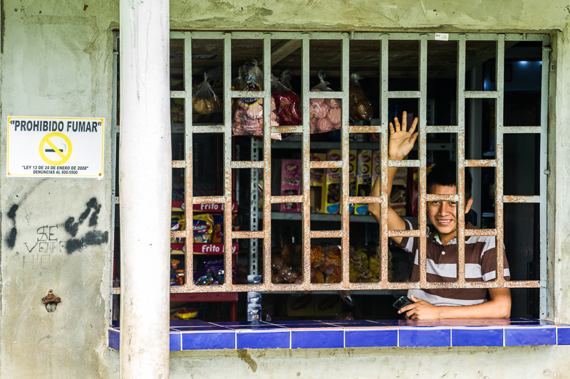 20130810EmberaIndians-2905.jpg :: Young boy managing a store near Chagres National Park