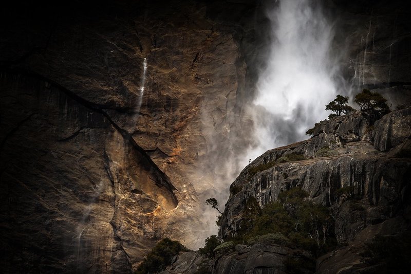 Light on Yosemite Falls.jpg :: This is one of my favorite shots of Yosemite Falls.  It is all about the light, from the back lighting behind the tree in the lower center, to the light and color on the rock wall behind it.
