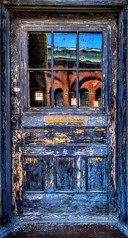 MIdoorno1.jpg :: A door with personality and an obvious history.