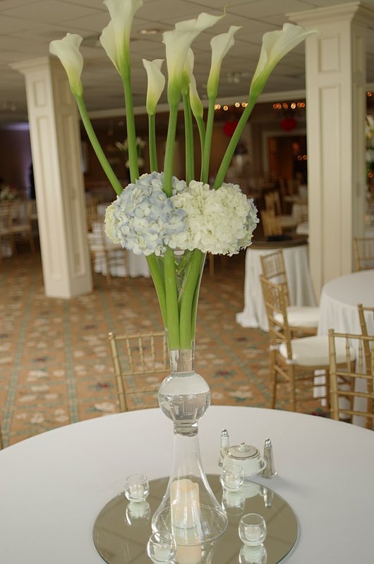 Calla lily arrangement for June 15 wedding.jpg