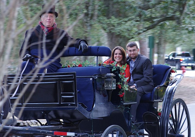 Kate and Matts engagement party carriage ride.jpg