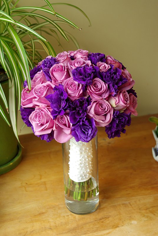 Rose pink and purple wrapped with jewled ribbon.jpg