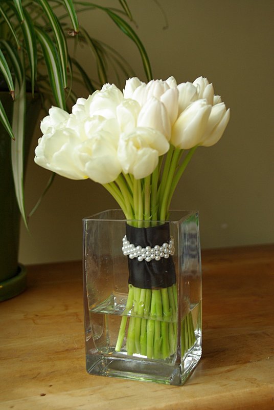 White tulip bouquet with brown ribbon and jewel wrap.jpg