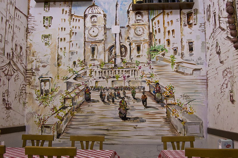 _MG_4363(1).jpg :: Scene on wall in cafe where we got a croissant and coffee for breakfast