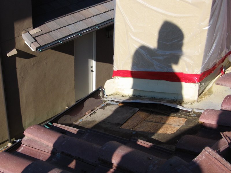 IMG_0224.jpg :: Chimney-roof flashing leak.