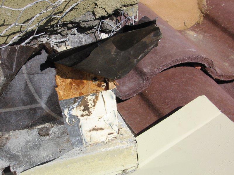 IMG_0245.jpg :: Chimney-roof flashing leak.