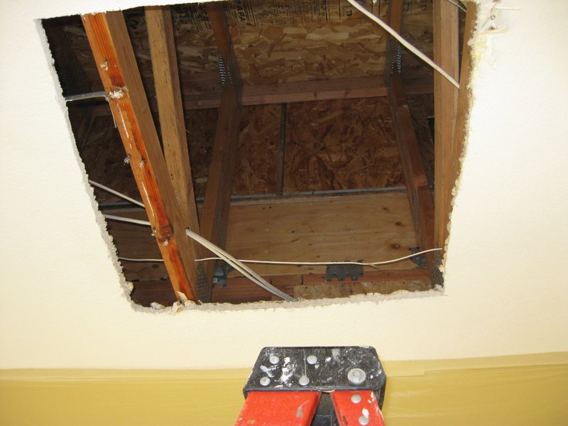 Roof water intrusion (22).jpg :: Inspecting and locating the intrusion of water.