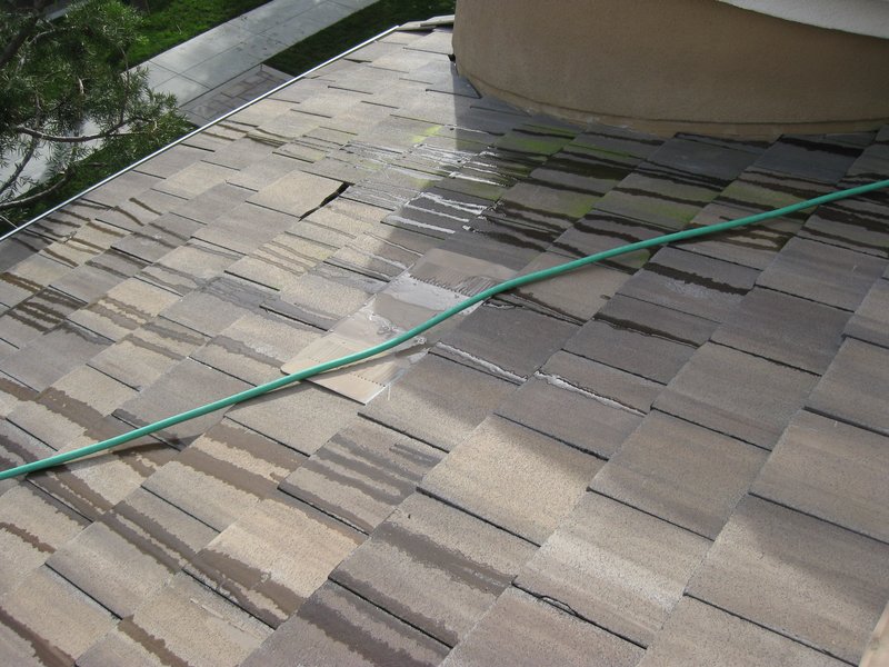 Roof water intrusion (44).jpg :: Inspecting and locating the intrusion of water.