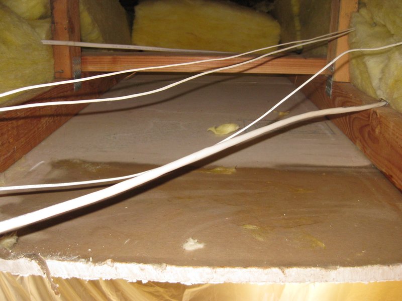 Roof water intrusion (87).jpg :: Inspecting and locating the intrusion of water.