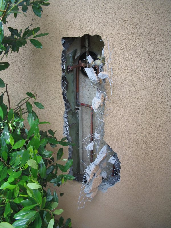 Shower valve leak 1.jpg :: Pinhole leak behind shower valve.