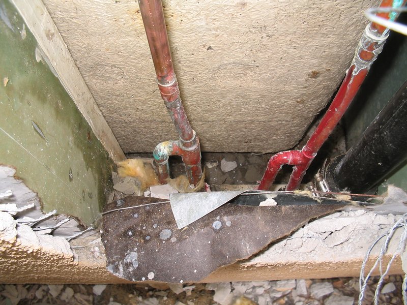 Shower valve leak 2.jpg :: Pinhole leak behind shower valve.