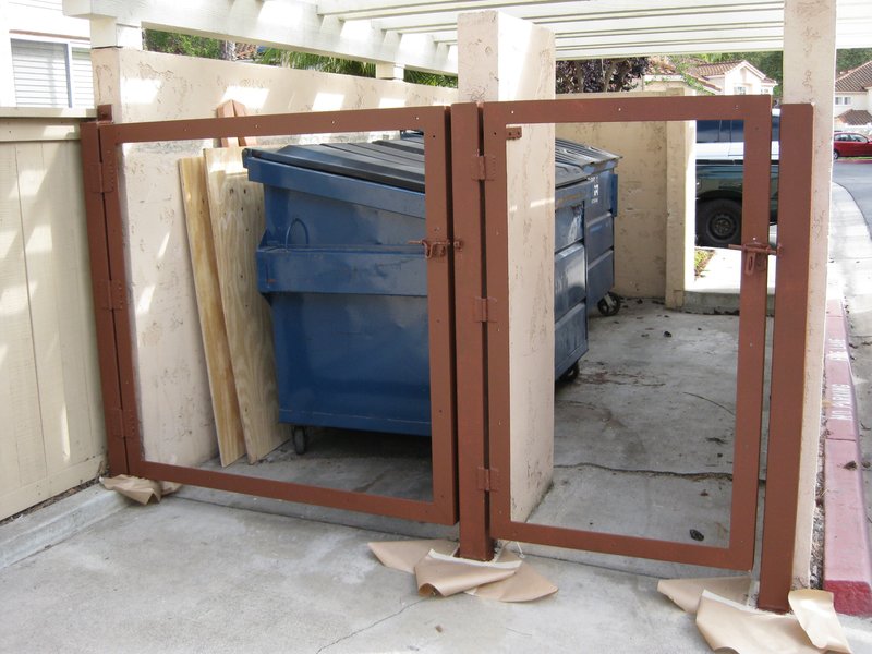 Trash enclosure doors (29).jpg :: Priming prior to paint