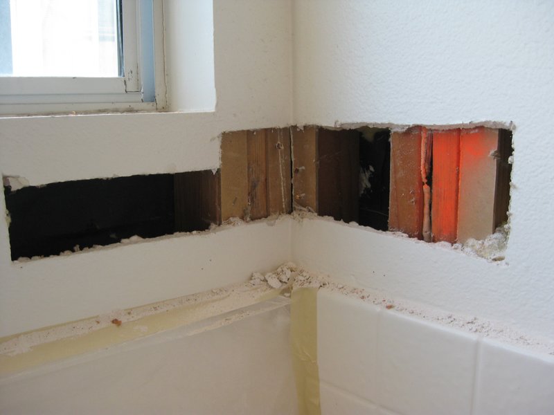 inspection.jpg :: Water intrusion from window flashing