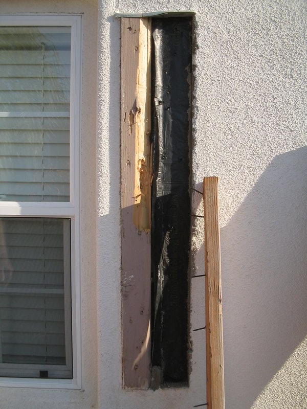 todds pictures 066.jpg :: Wood shutter leak.