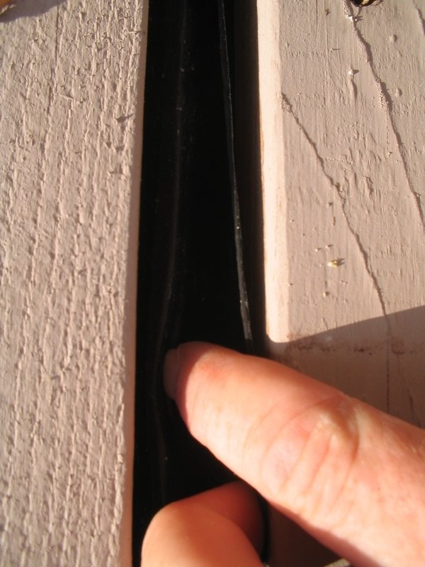 todds pictures 071.jpg :: Wood shutter leak.