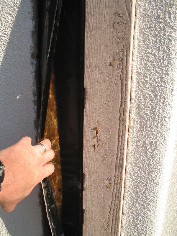 todds pictures 072.jpg :: Wood shutter leak.