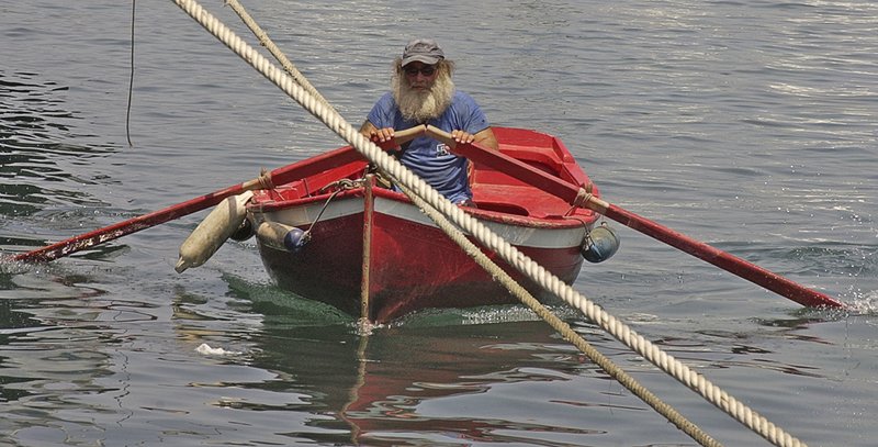 Man in boat 2.jpg ::                                