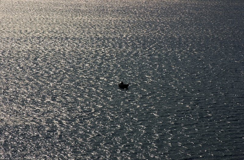 Man in boat..jpg ::                                