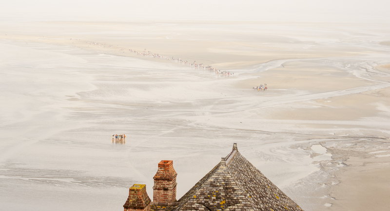Mont-Saint Michel 3.jpg :: Low tide at the Mont.  Note the tour groups on the sand at low tide.