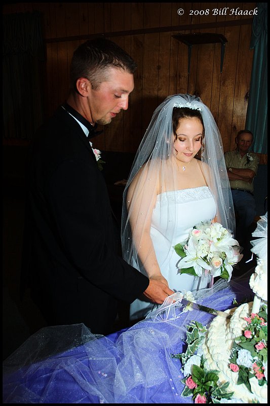 300_DSC_8678 Mr and Mrs cutting cake edited 800x1200 060708.jpg