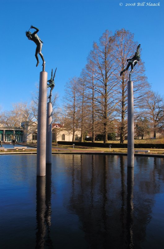 64_DSC_5524 MOBOT tower statues reflect h2o blu sky 022908.jpg