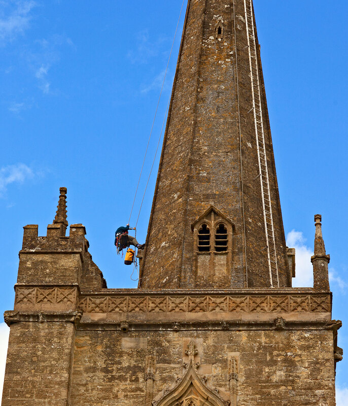 BFD21_013.jpg :: Steeplejack working on the Spire of St John the Baptist Church, Burford, Oxfordshire