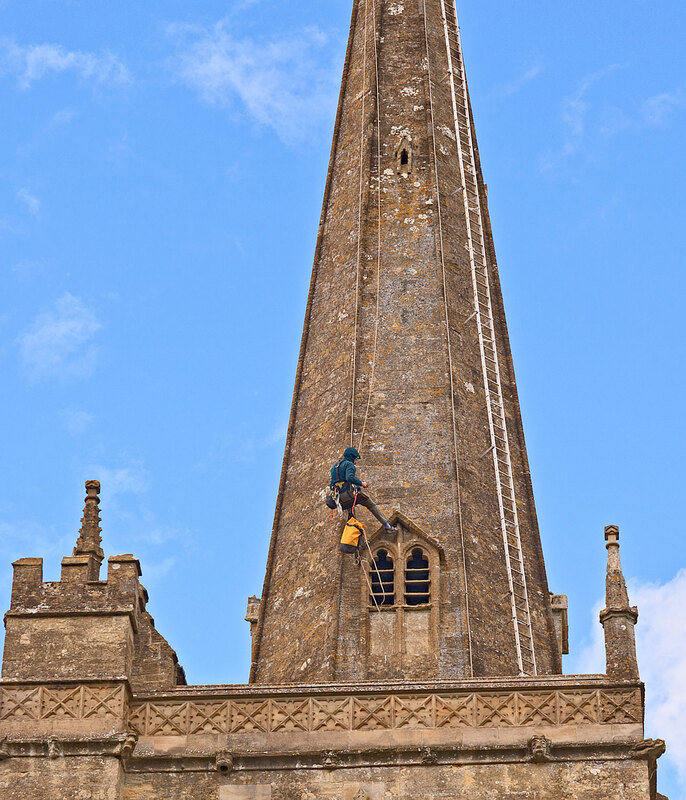 BFD21_015.jpg :: Steeplejack working on the Spire of St John the Baptist Church, Burford, Oxfordshire