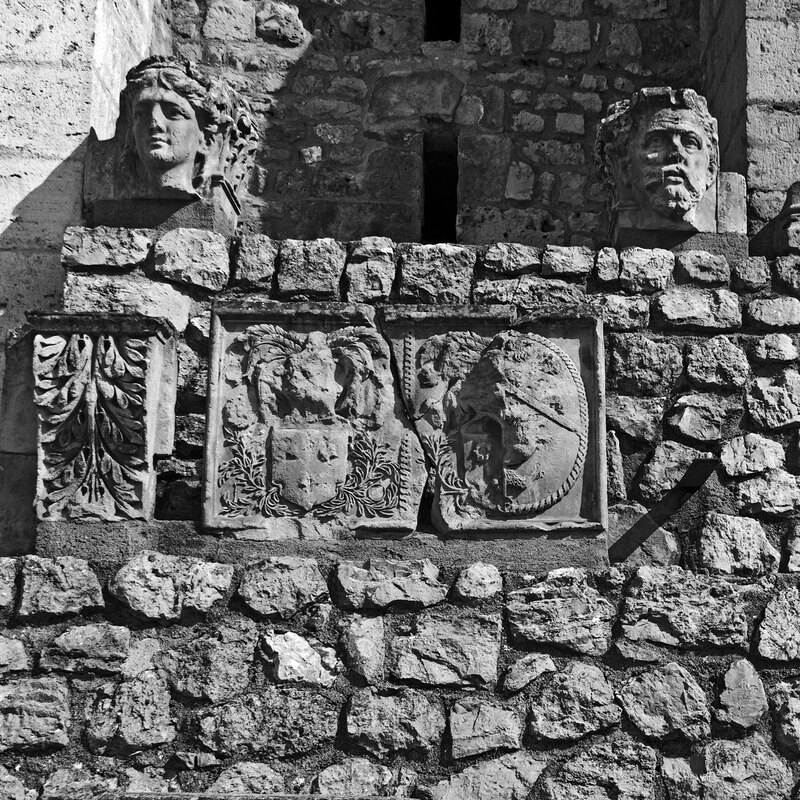 FRA_97903w(1).jpg :: Stone Carvings along the wall of Château Gien in France
