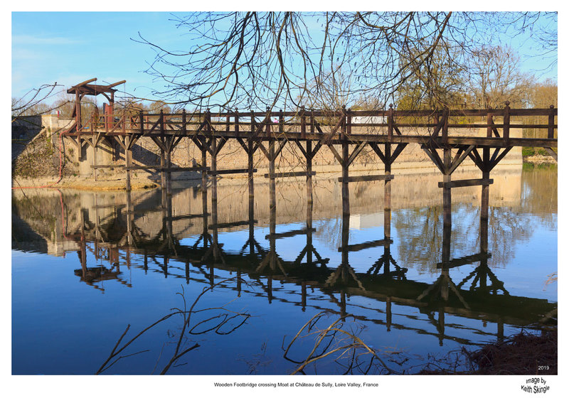 FRA_9852(1).jpg :: Wooden Drawbridge reflecting in moat at Château de Sully, France
