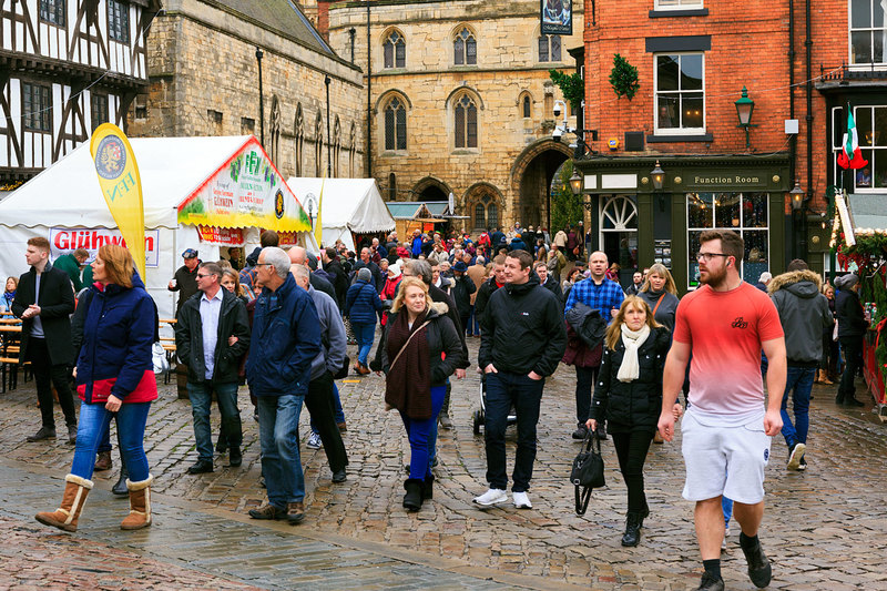 LCM_001(1).jpg :: Visitors to the Lincoln Christmas Market on Exchequer gate Lincoln Cathedral Quarter