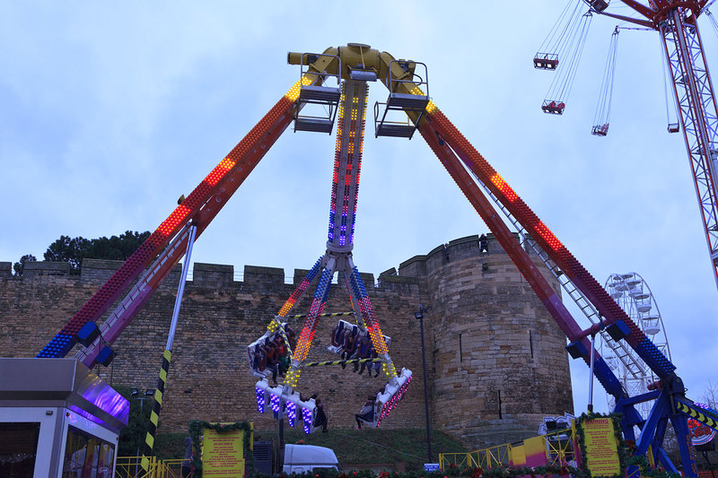 LCM_035(1).jpg :: Lincoln Christmas Market Fairground Ride in front of Lincoln Castle Lincolnshire UK