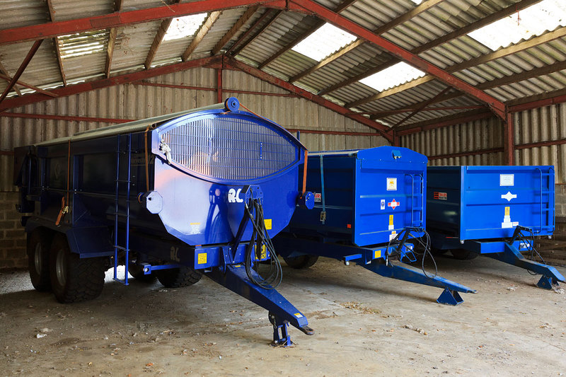 MKC19_032.jpg :: Farm trailers stored on portal frame barn