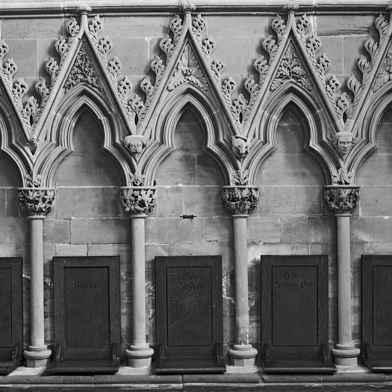 NSW19_0472w.jpg :: 13th century stone carvings around the seats in the Chapter House of Southwell Minster, Nottinghamshire