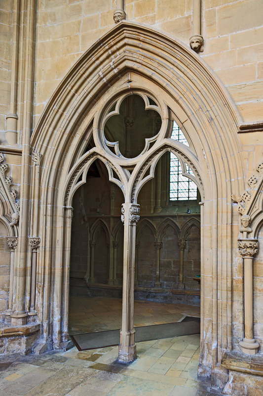 NSW19_0531.jpg :: 13th century carved stone arch entrance to the Charter House at Southwell Minster, Nottinghamshire