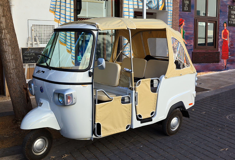 SPN19_445.jpg :: Modern Tuk-Tuk parked in Fora Mur street in Dénia, Costa Blance, Spain