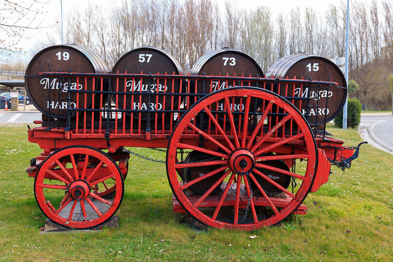 SPN19_553.jpg :: Old Horse Drawn Wooden Cart used for tranporting Barrels of Wine opposite Bodegas Muga, Haro, La Rioja, Spain
