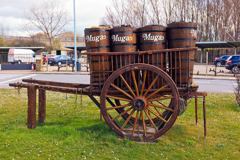SPN19_554.jpg :: Old Horse Drawn Wooden Cart used for tranporting Barrels of Wine opposite Bodegas Muga, Haro, La Rioja, Spain