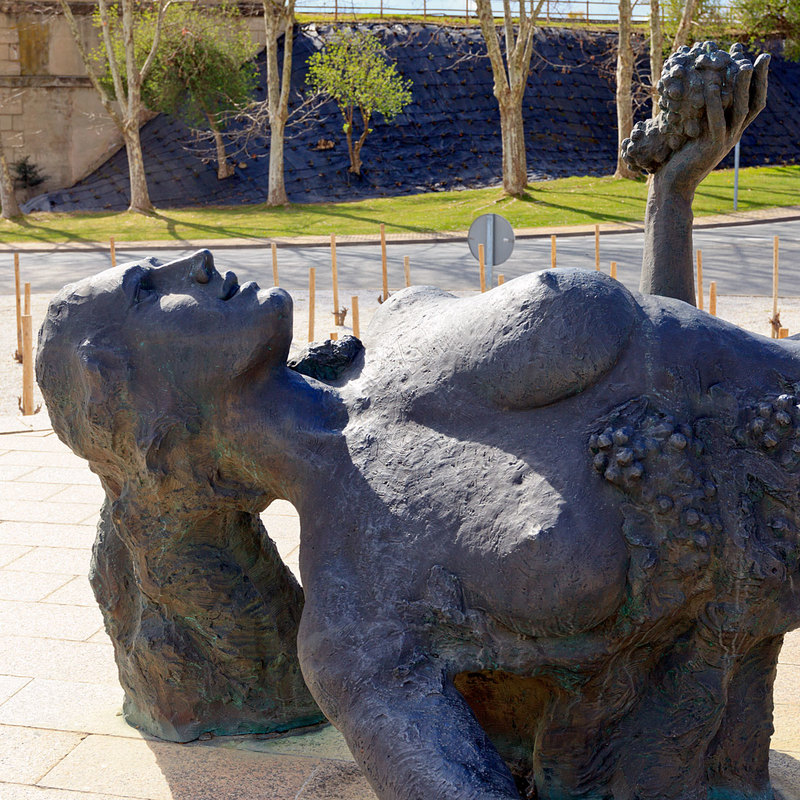 SPN19_556.jpg :: Monuments of La Vendimia 'sculpture of naked woman in reclined position with grapes' Bodegas Muga, Haro, La Rioja, Spain