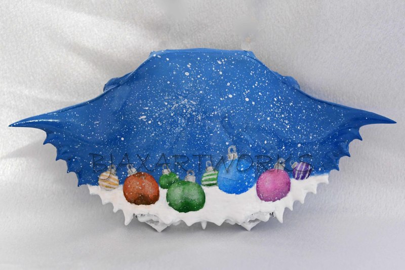 Colored Christmas Ornaments In Snow.jpg