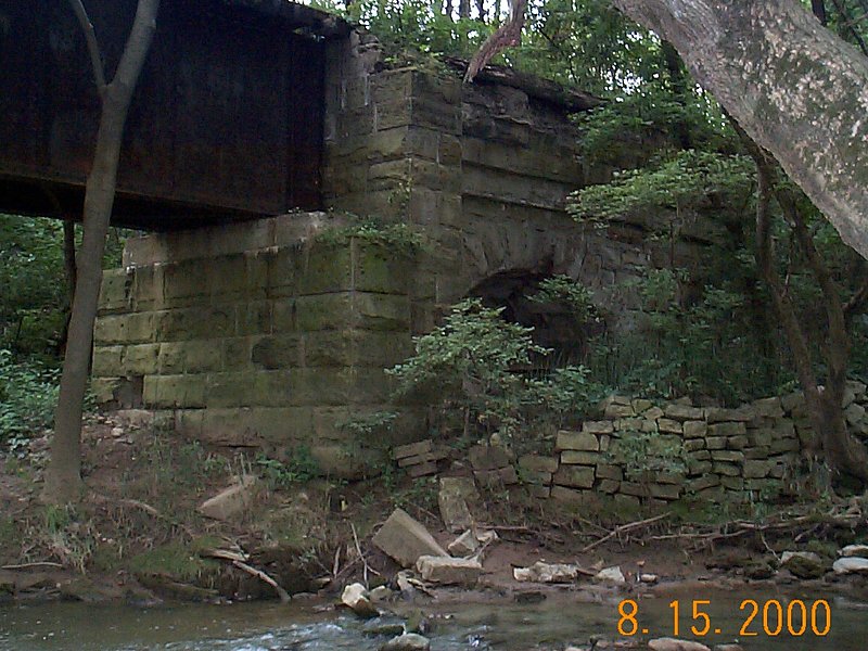 An-abandoned-railroad-stone-arch.jpg