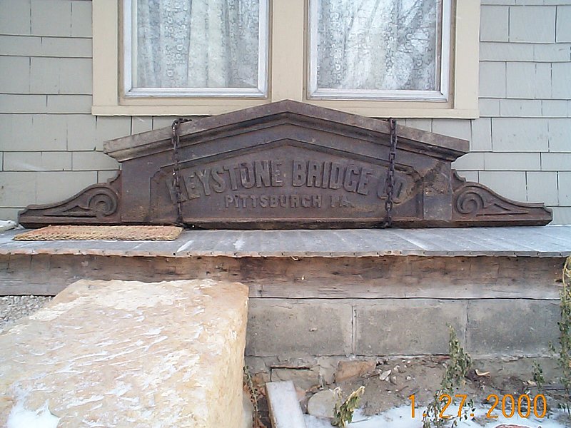 Bridge Builders Plaque from the demolished Keystone Bridge Company B and O Railroad Overpass.jpg :: The Bridge Builders Plaque from the demolished Keystone Bridge Company B&O Railroad Overpass near FREDERICKTOWN OH on our porch in Painesville