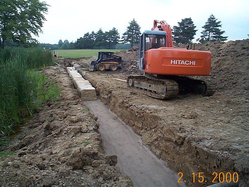 Laying the First Course of the reclaimed Bridgestone installation at Powderhorn Country Club.jpg :: Laying the First Course of the Reclaimed Bridgestone installation at Powderhorn Country Club in Madison OH Hole 1